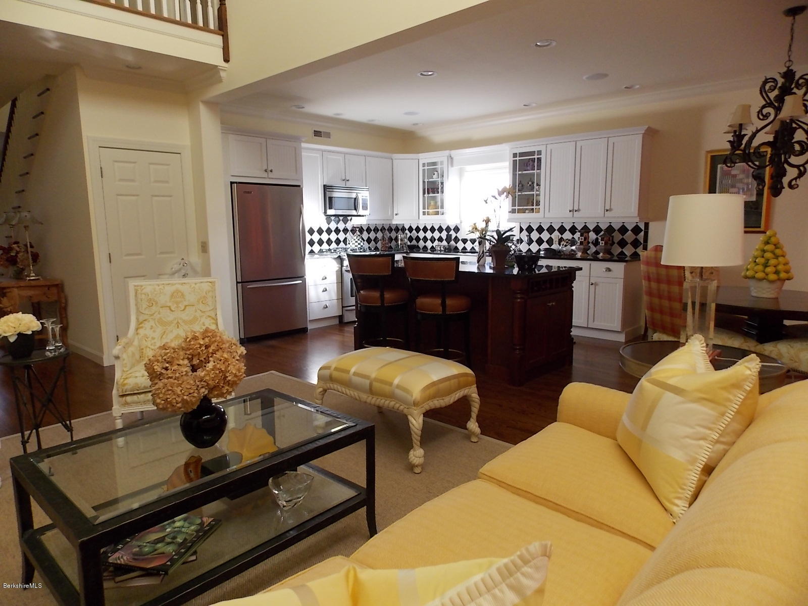 18 High Crest Road, Unit 18 Lenox, MA 01240 - Photo 33 of 34 a living room with furniture and wooden floor
