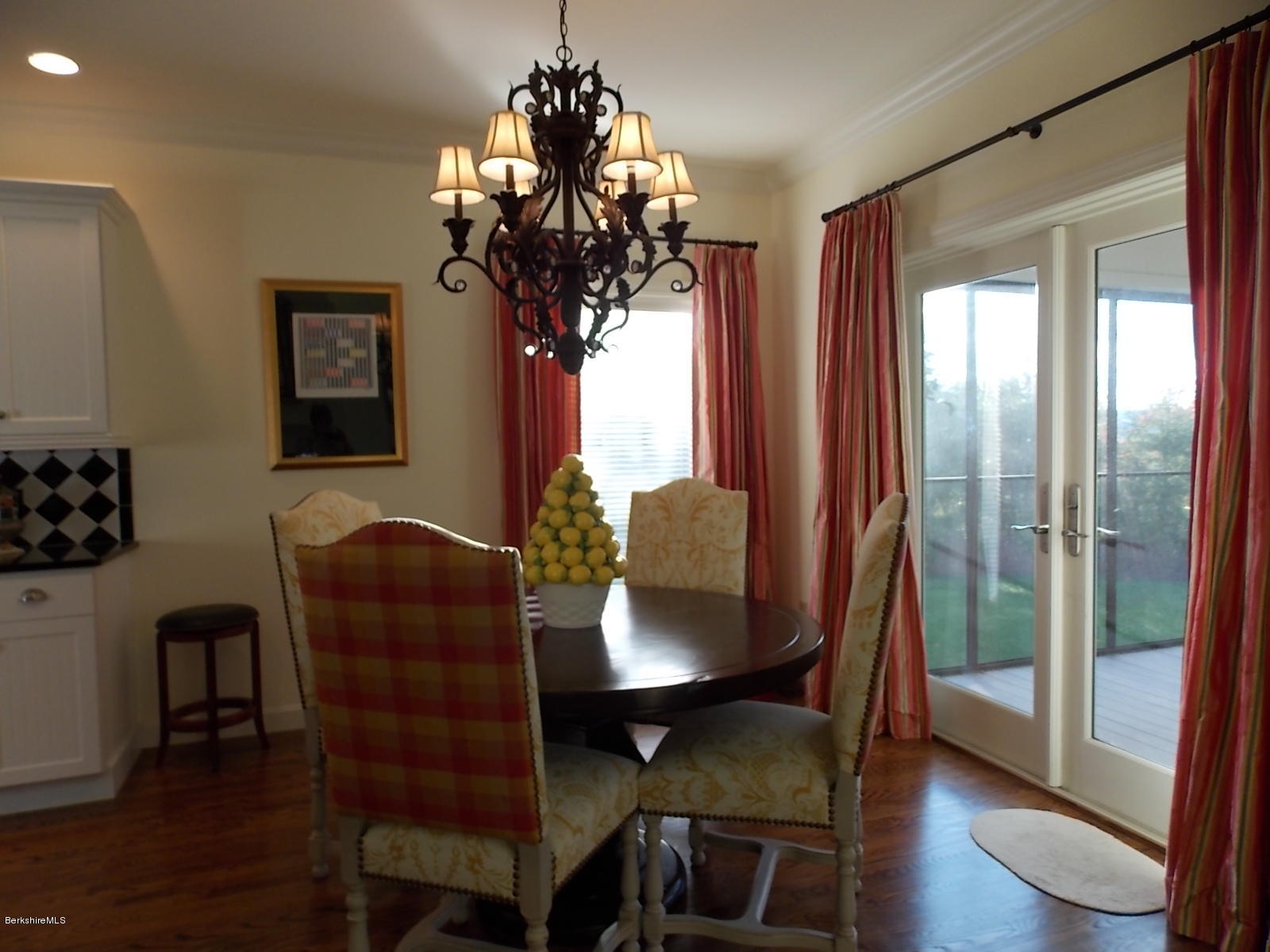 18 High Crest Road, Unit 18 Lenox, MA 01240 - Photo 7 of 34 a dining room with furniture wooden floor and a chandelier