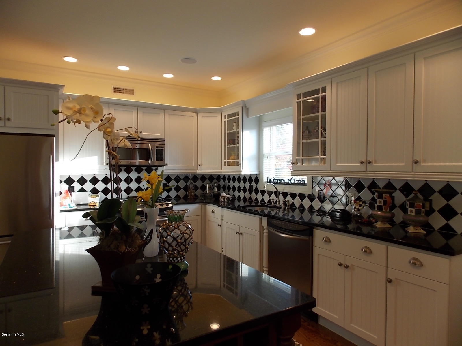 18 High Crest Road, Unit 18 Lenox, MA 01240 - Photo 8 of 34 a kitchen with granite countertop a sink a counter space appliances and cabinets