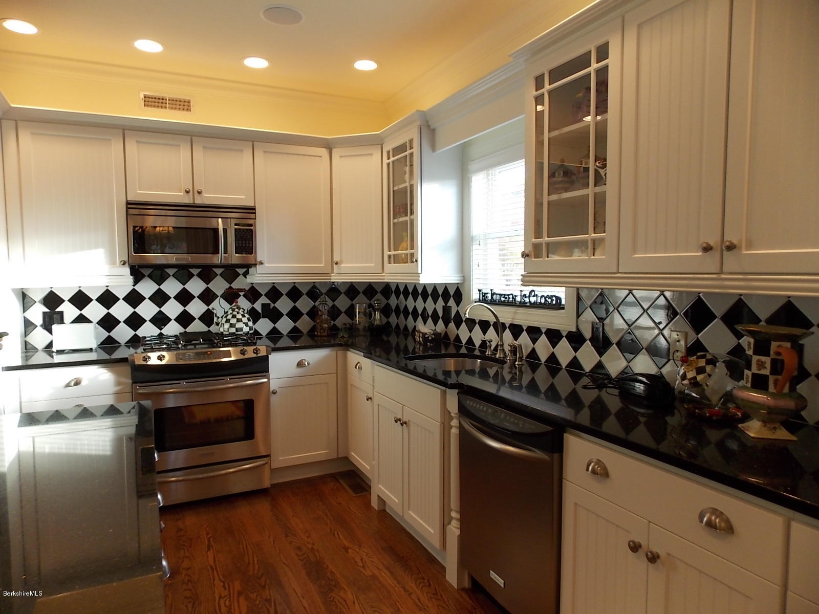 18 High Crest Road, Unit 18 Lenox, MA 01240 - Photo 10 of 34 a kitchen with granite countertop a sink and a stove