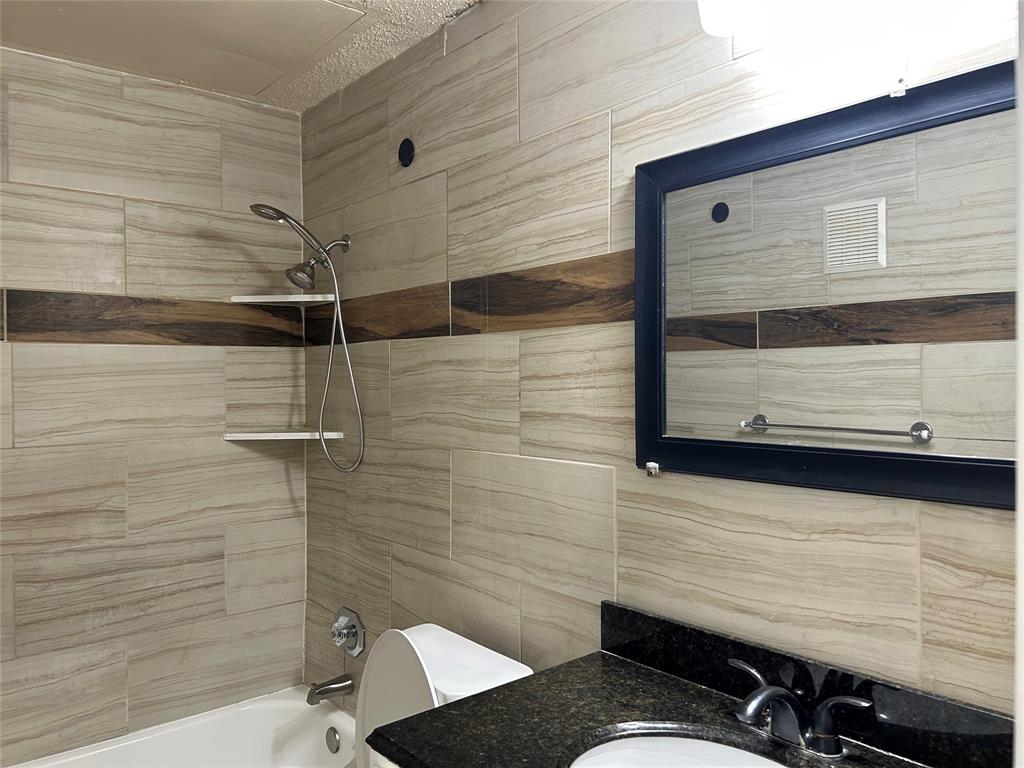 4101 Esters Road, Unit 101 Irving, TX 75038 - Photo 7 of 11 a bathroom with a shower