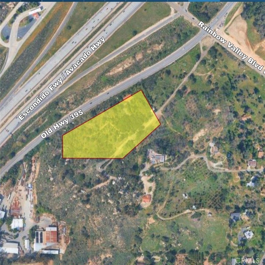 a view of a swimming pool with a yard