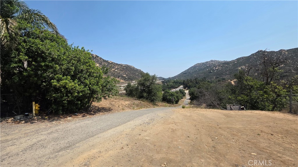 3027 Rainbow Valley Boulevard Fallbrook, CA 92028 - Photo 3 of 7 a view of a backyard of a house