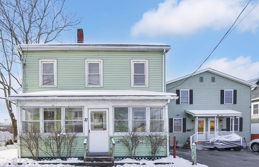 21 Depot Street Chicopee, MA 01013 - Photo 1 of 31 a front view of a house with a yard