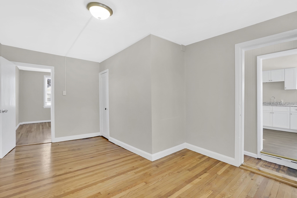 21 Depot Street Chicopee, MA 01013 - Photo 28 of 31 wooden floor in an empty room