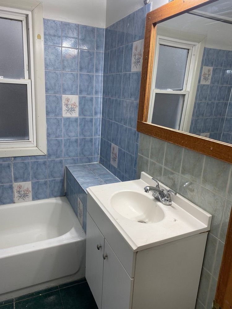 1828 North Pulaski Road, Unit 2 Chicago, IL 60639 - Photo 6 of 6 a bathroom with a sink and a bathtub