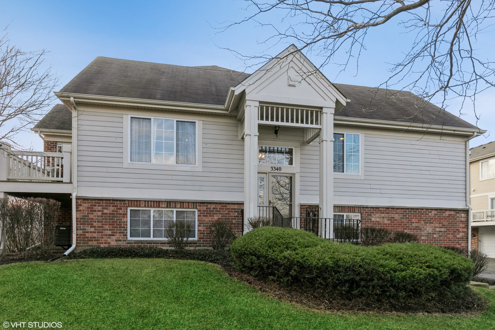 3340 Cameron Drive Elgin, IL 60124 - Photo 1 of 18 a front view of a house with a yard