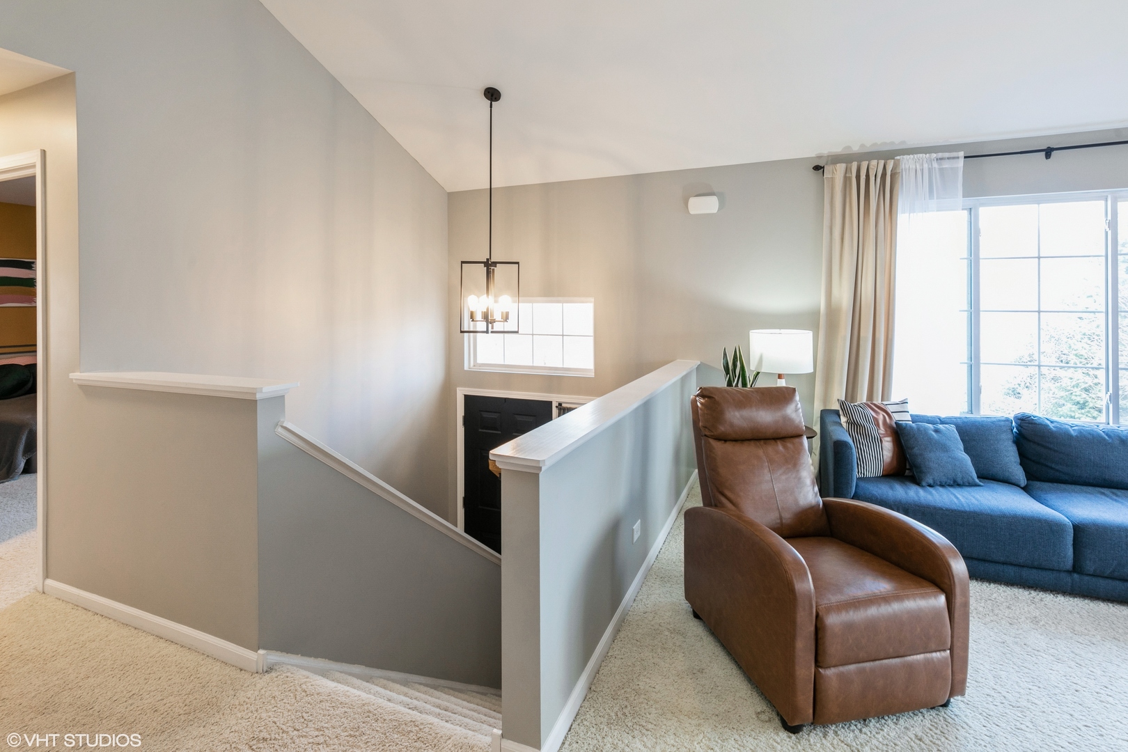 3340 Cameron Drive Elgin, IL 60124 - Photo 3 of 18 a living room with furniture and a chandelier