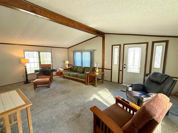 a living room with furniture and a couch