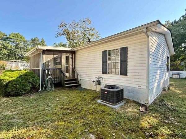 a view of a house with backyard