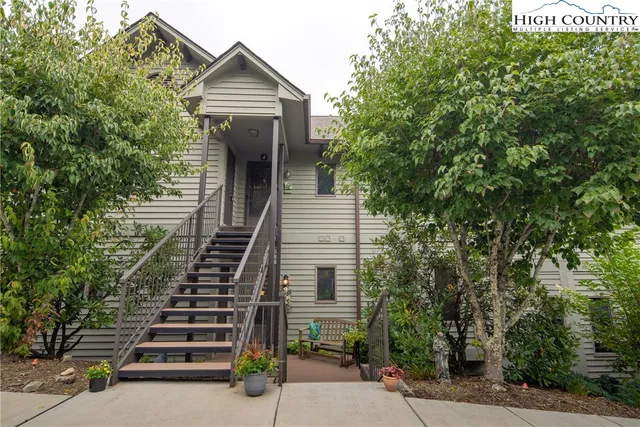 a view of a house with a street