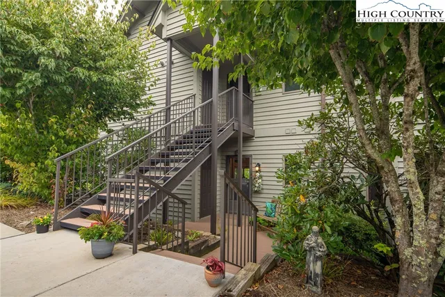 a view of stairs and yard