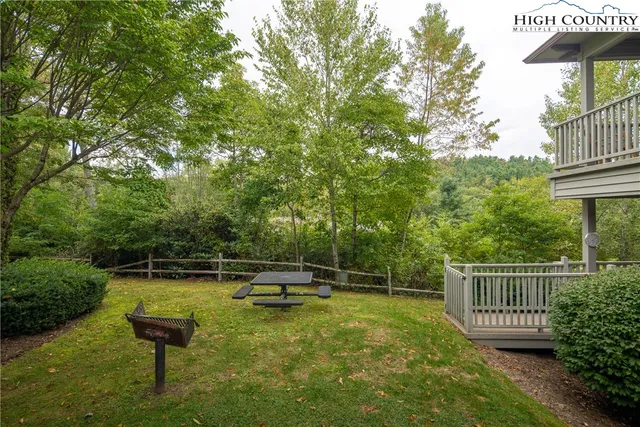 a view of street with parked cars