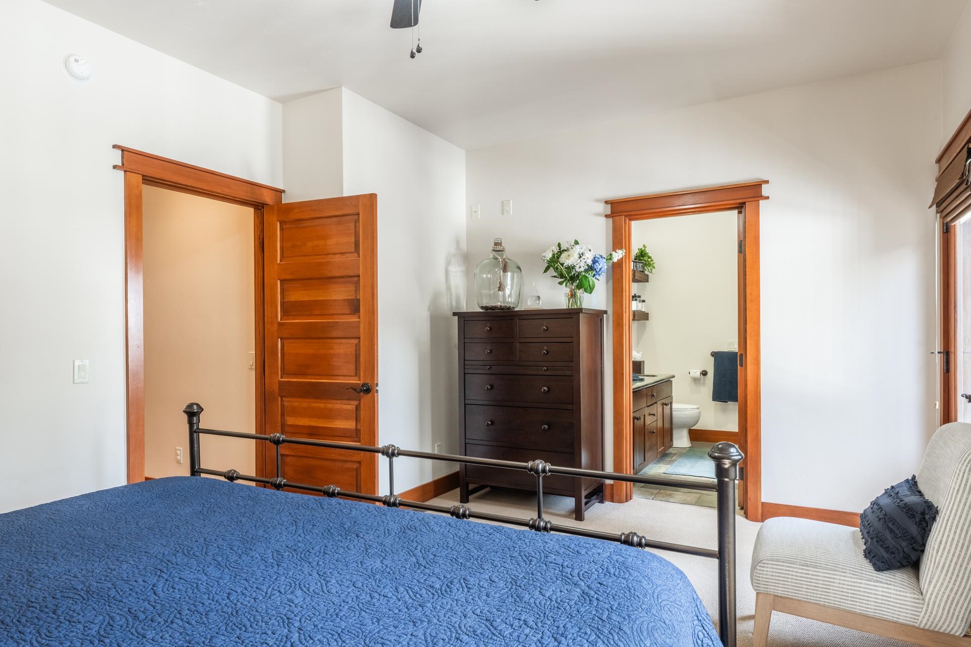 125 Davison Road, Unit 1 Mammoth Lakes, CA 93546 - Photo 19 of 46 a bedroom with furniture and a gate