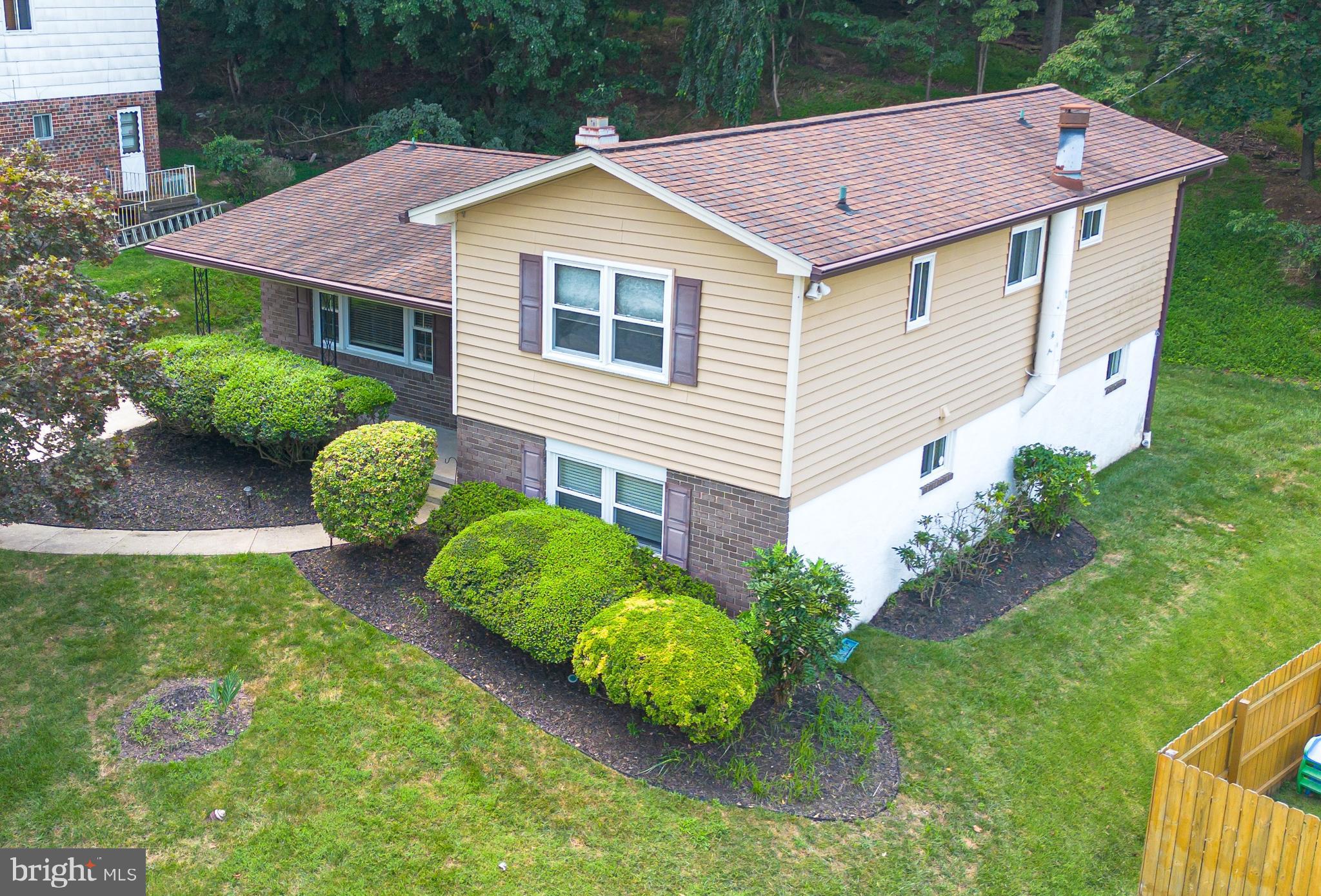 4523 Hawksbury Road Baltimore, MD 21208 - Photo 1 of 35 a aerial view of a house with garden