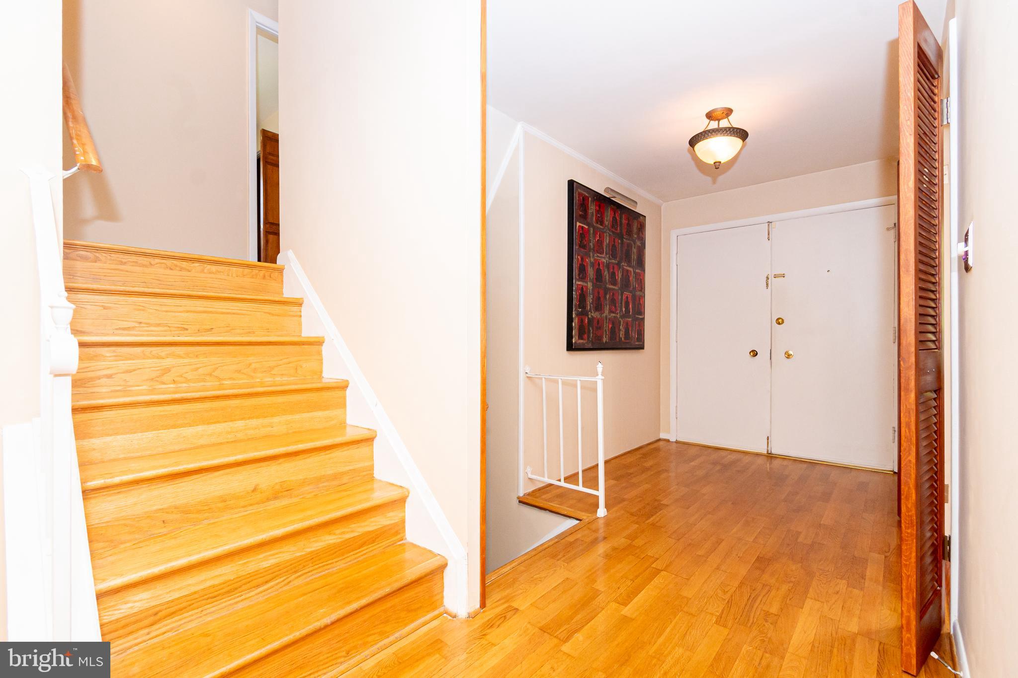 4523 Hawksbury Road Baltimore, MD 21208 - Photo 5 of 35 a view of entryway with wooden floor