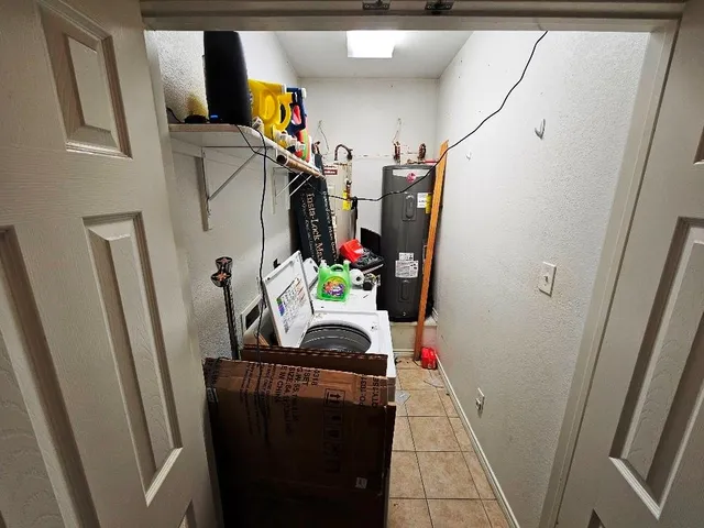 a view of living room with furniture and entryway