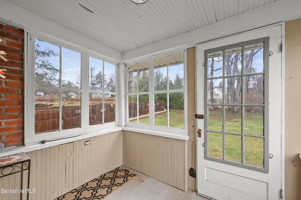 a view of a room with a large window