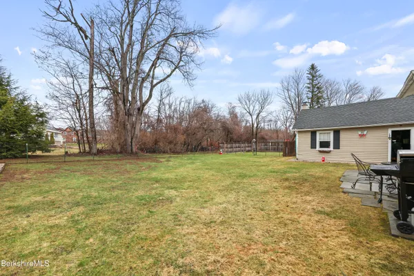 a view of a yard in front of house