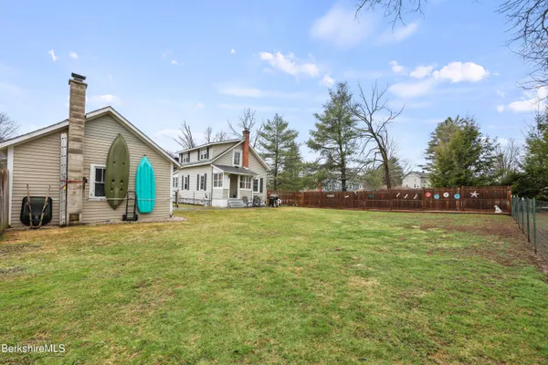 a view of a house with a big yard