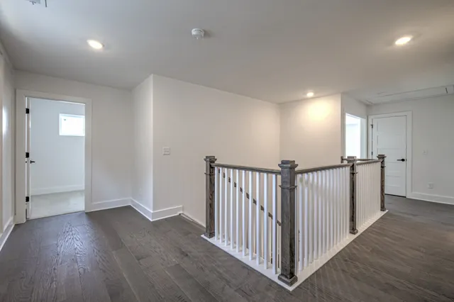 a view of a hallway with a window