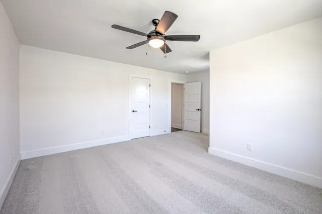 a bathroom with a double vanity sink mirror double and shower
