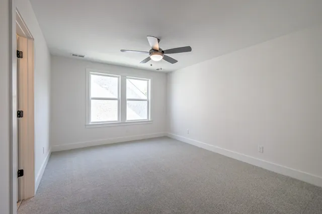 a view of a room with rack on the wall