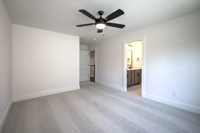 a white bath tub and shower