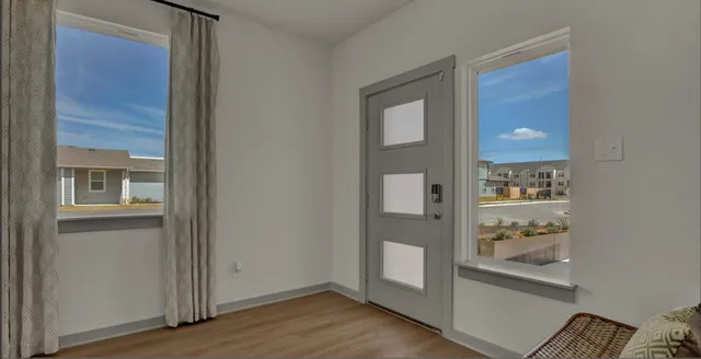 a view of livingroom with furniture and wooden floor