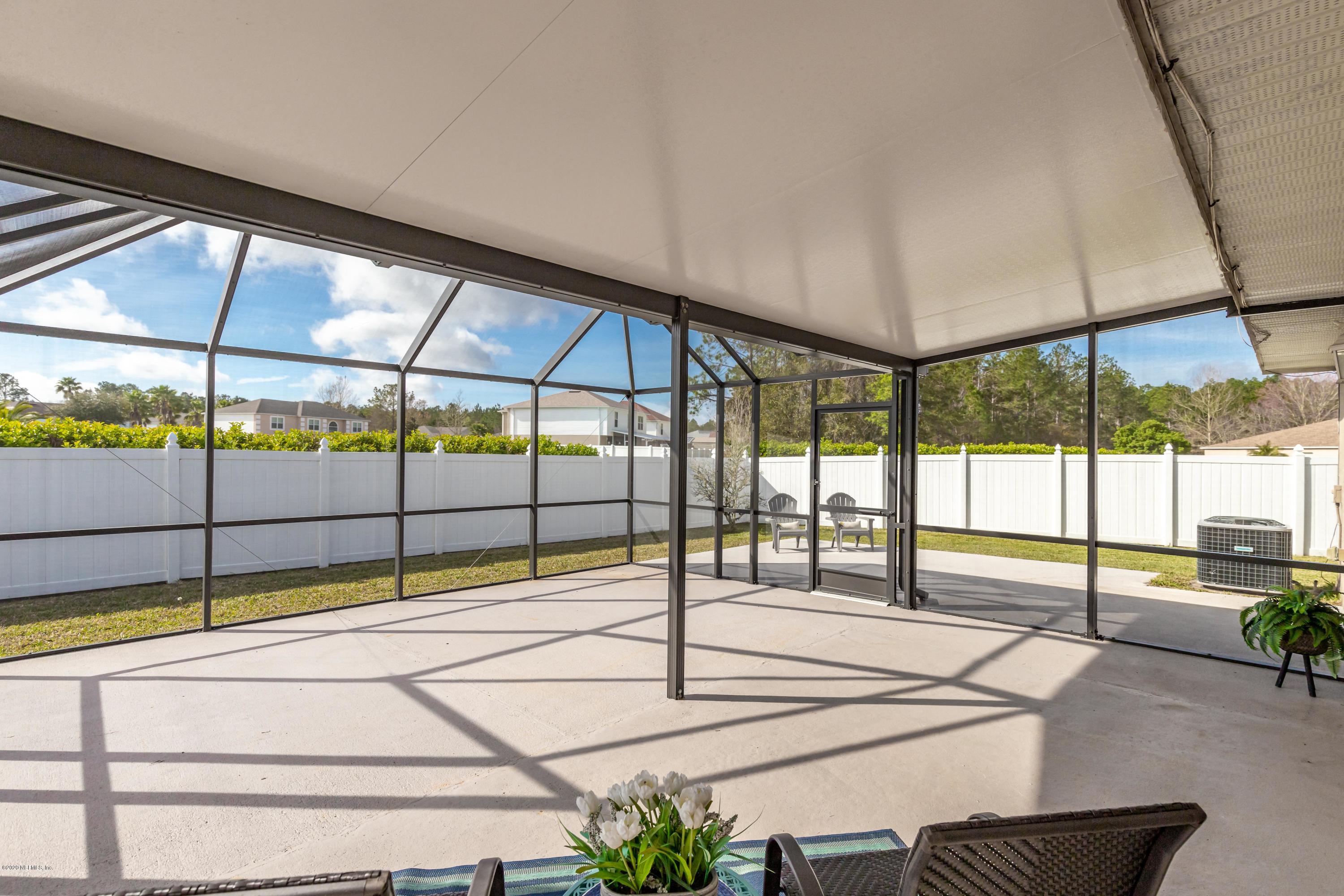3063 Valkyrie Road Middleburg, FL 32068 - Photo 9 of 49 Large Screened Patio