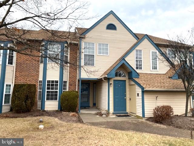 110 Allem Lane Perkasie, PA 18944 - Photo 1 of 13 a front view of a house with a yard and garage