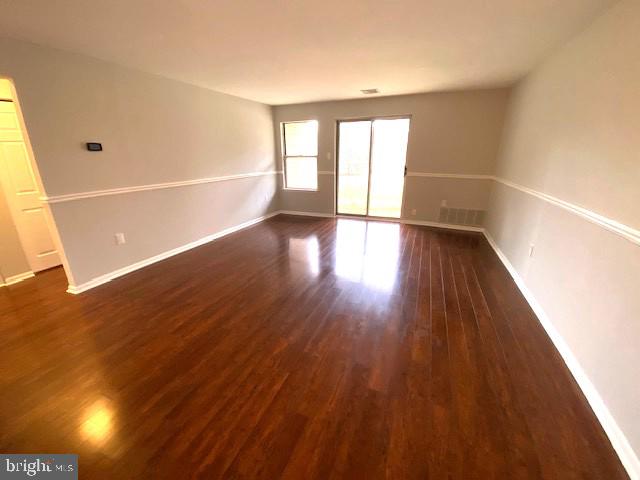 110 Allem Lane Perkasie, PA 18944 - Photo 4 of 13 wooden floor in an empty room with a window