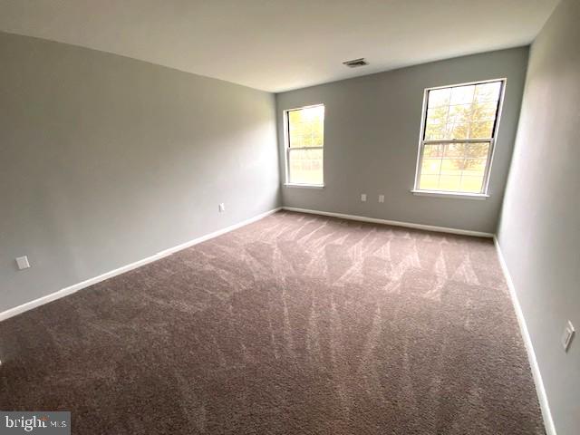 110 Allem Lane Perkasie, PA 18944 - Photo 9 of 13 an empty room with windows