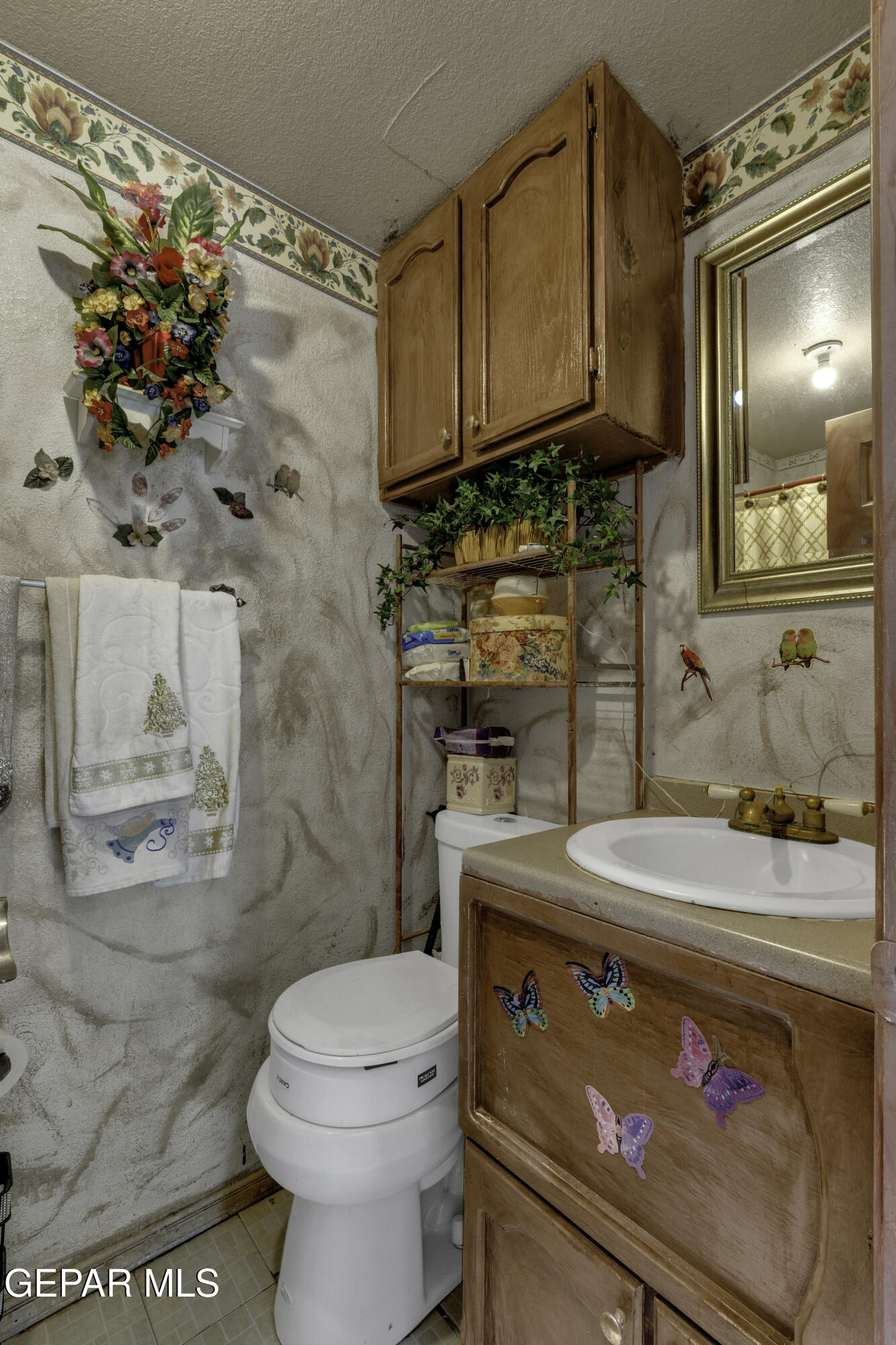 15931 Harrison Road El Paso, TX 79928 - Photo 14 of 83 a bathroom with a sink a toilet and shower