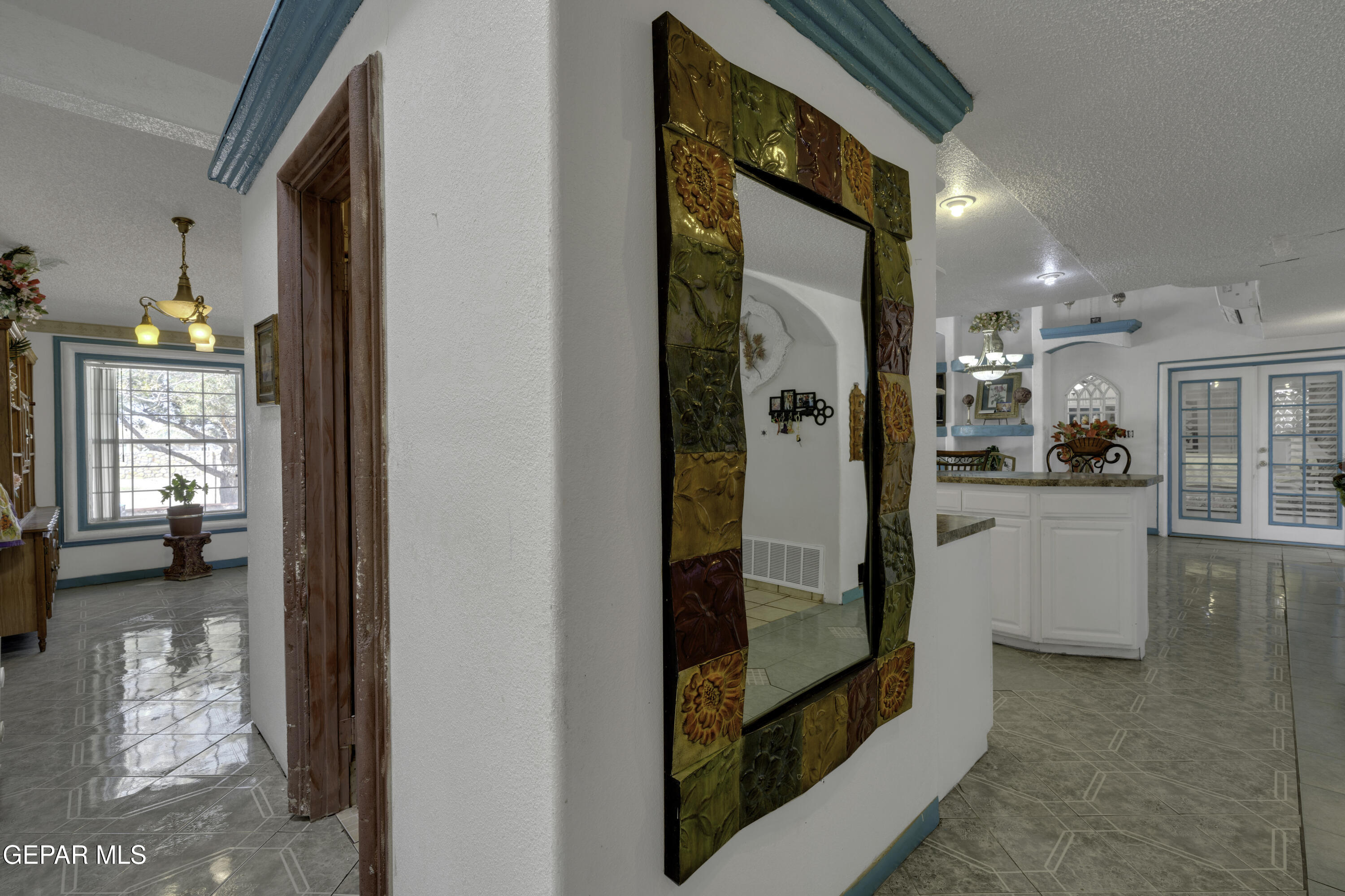 15931 Harrison Road El Paso, TX 79928 - Photo 30 of 83 a view of walk in closet with living room