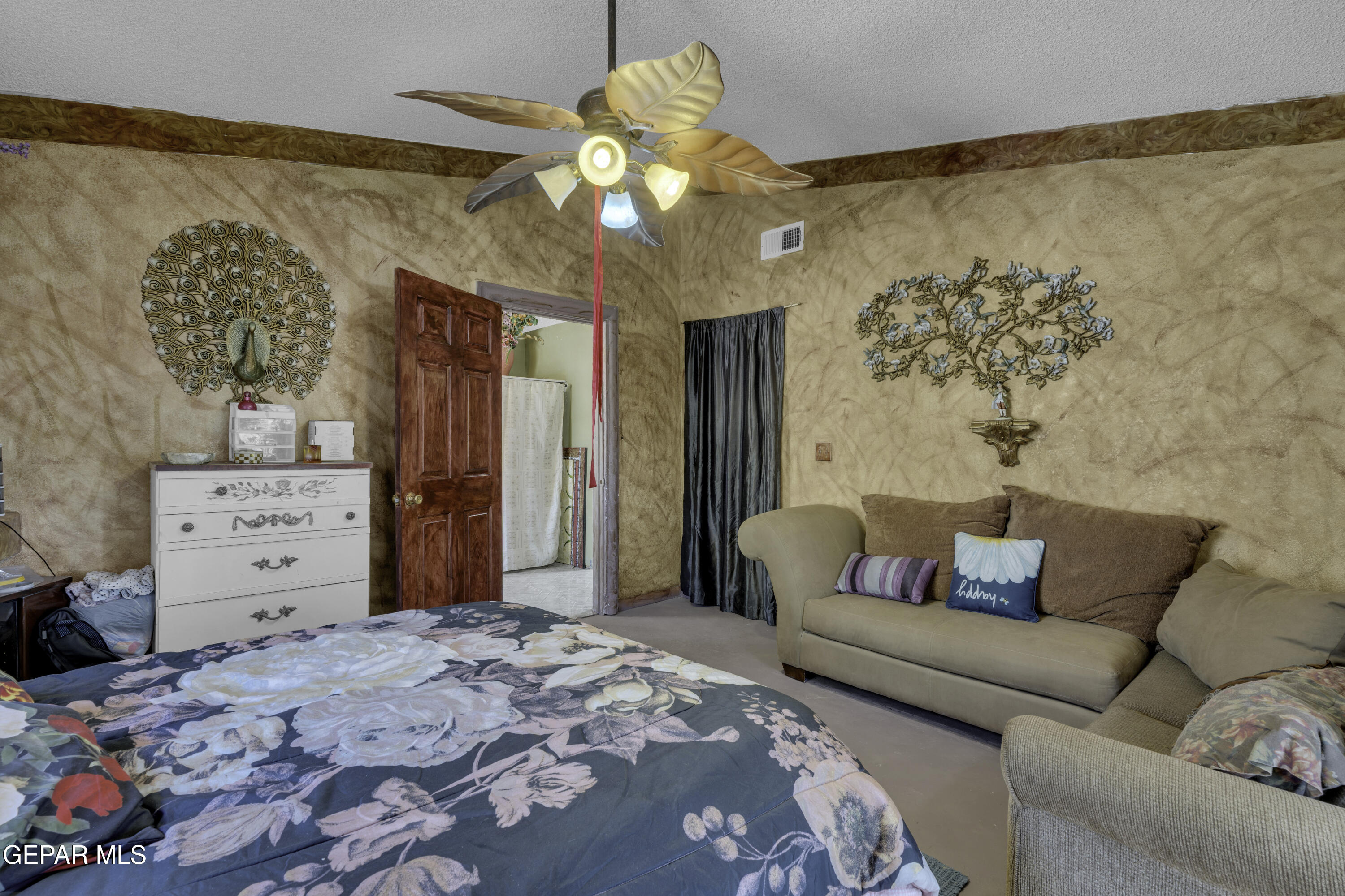 15931 Harrison Road El Paso, TX 79928 - Photo 37 of 83 a living room with furniture and a bed