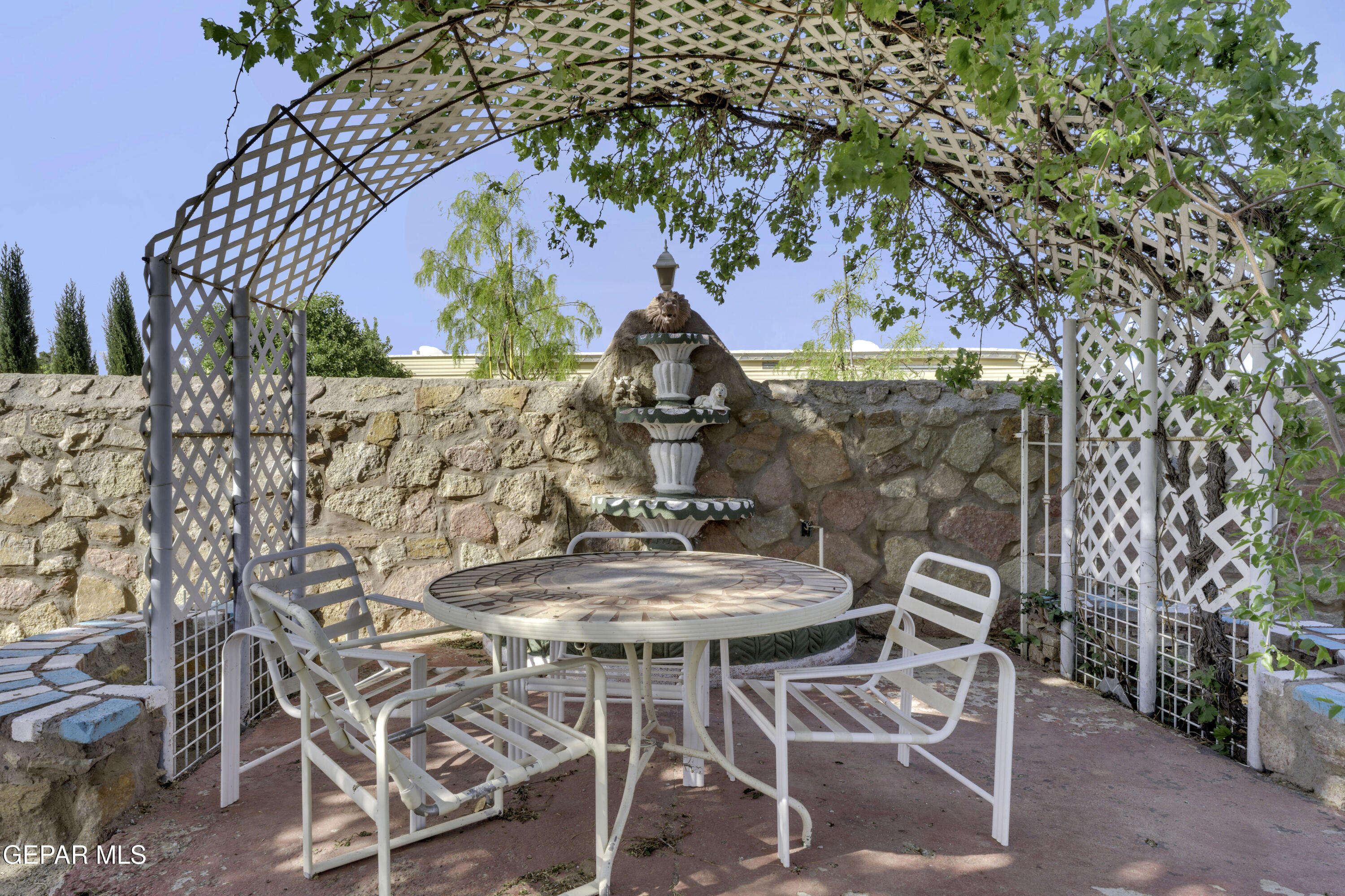 15931 Harrison Road El Paso, TX 79928 - Photo 43 of 83 a view of a chairs and table in the patio