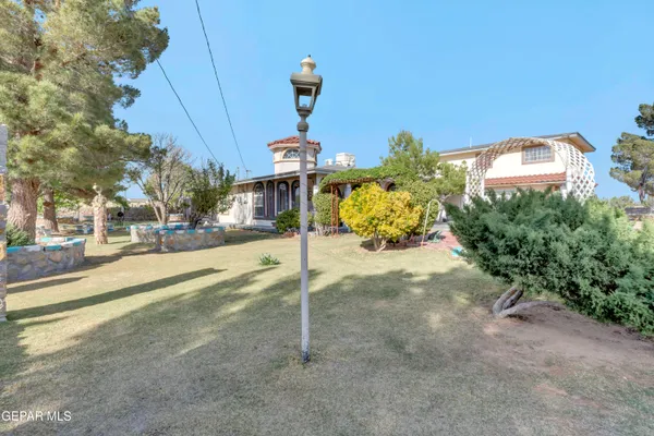 a house with palm tree in front of it