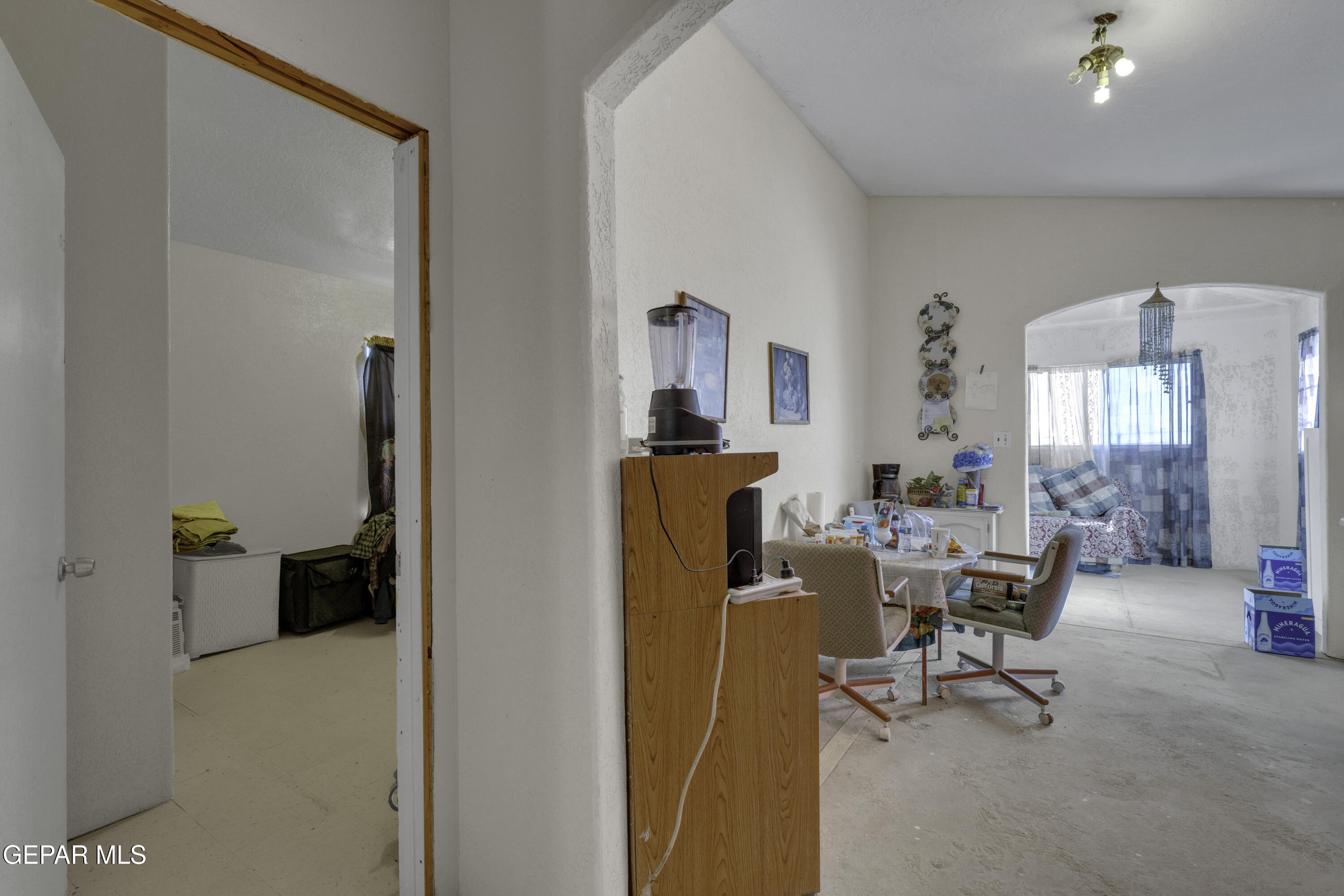 15931 Harrison Road El Paso, TX 79928 - Photo 61 of 83 a living room with furniture and a refrigerator