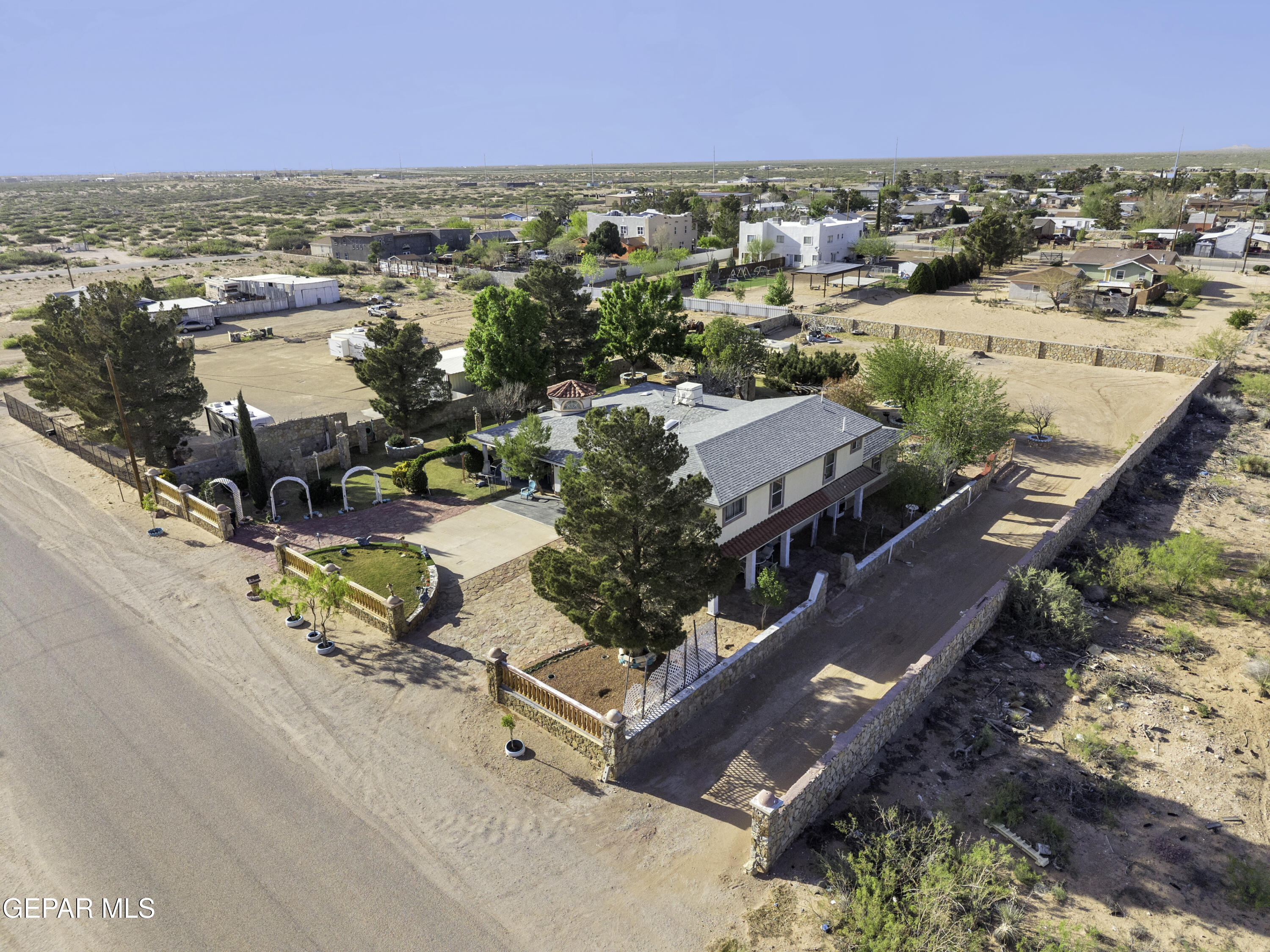 15931 Harrison Road El Paso, TX 79928 - Photo 66 of 83 an aerial view of residential houses with outdoor space