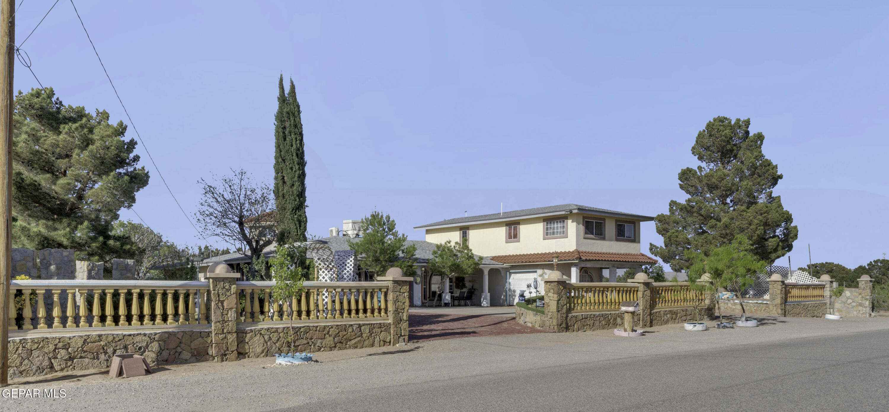 15931 Harrison Road El Paso, TX 79928 - Photo 69 of 83 a view of a brick house with a large windows