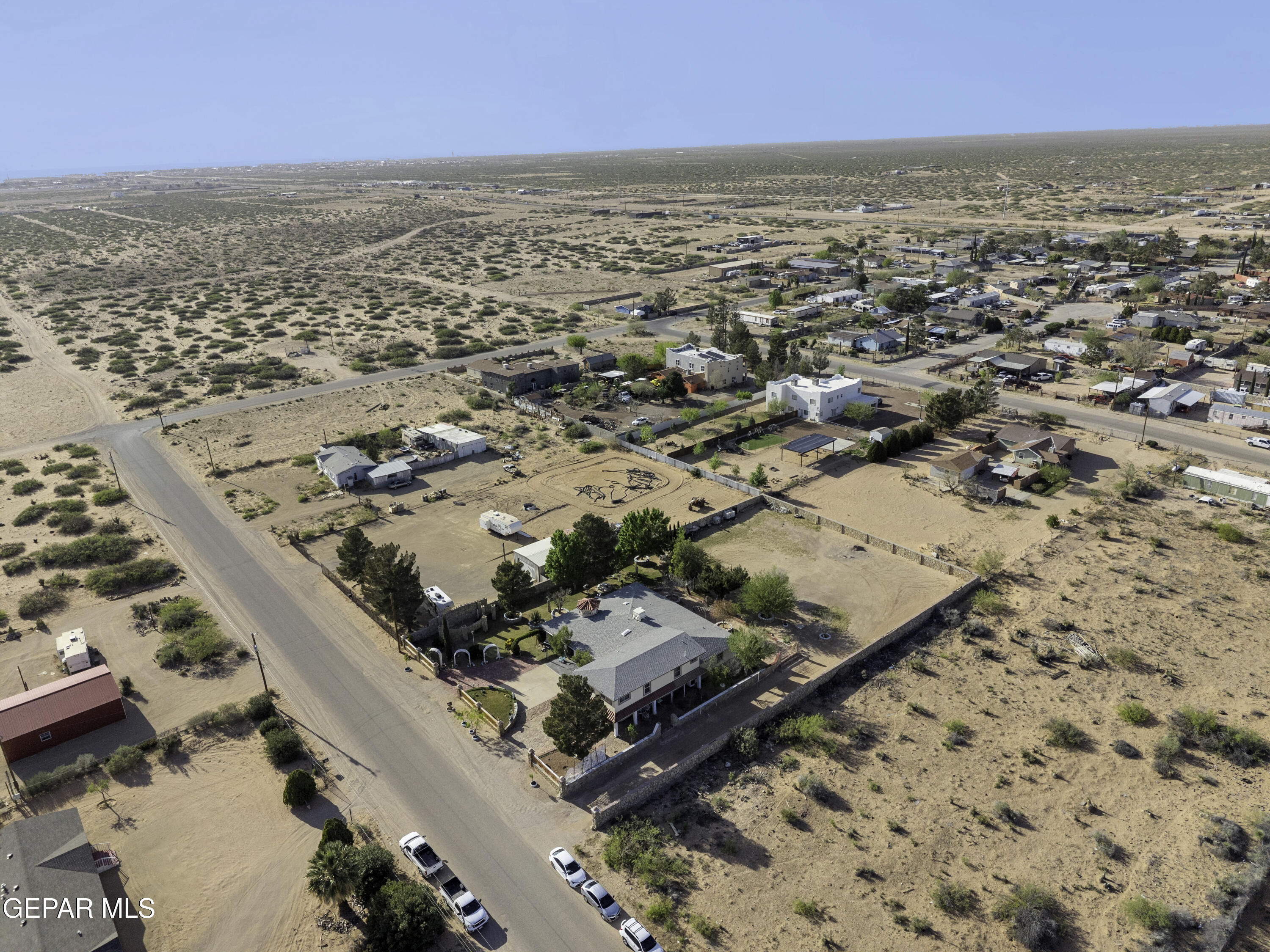 15931 Harrison Road El Paso, TX 79928 - Photo 78 of 83 an aerial view of residential houses with outdoor space