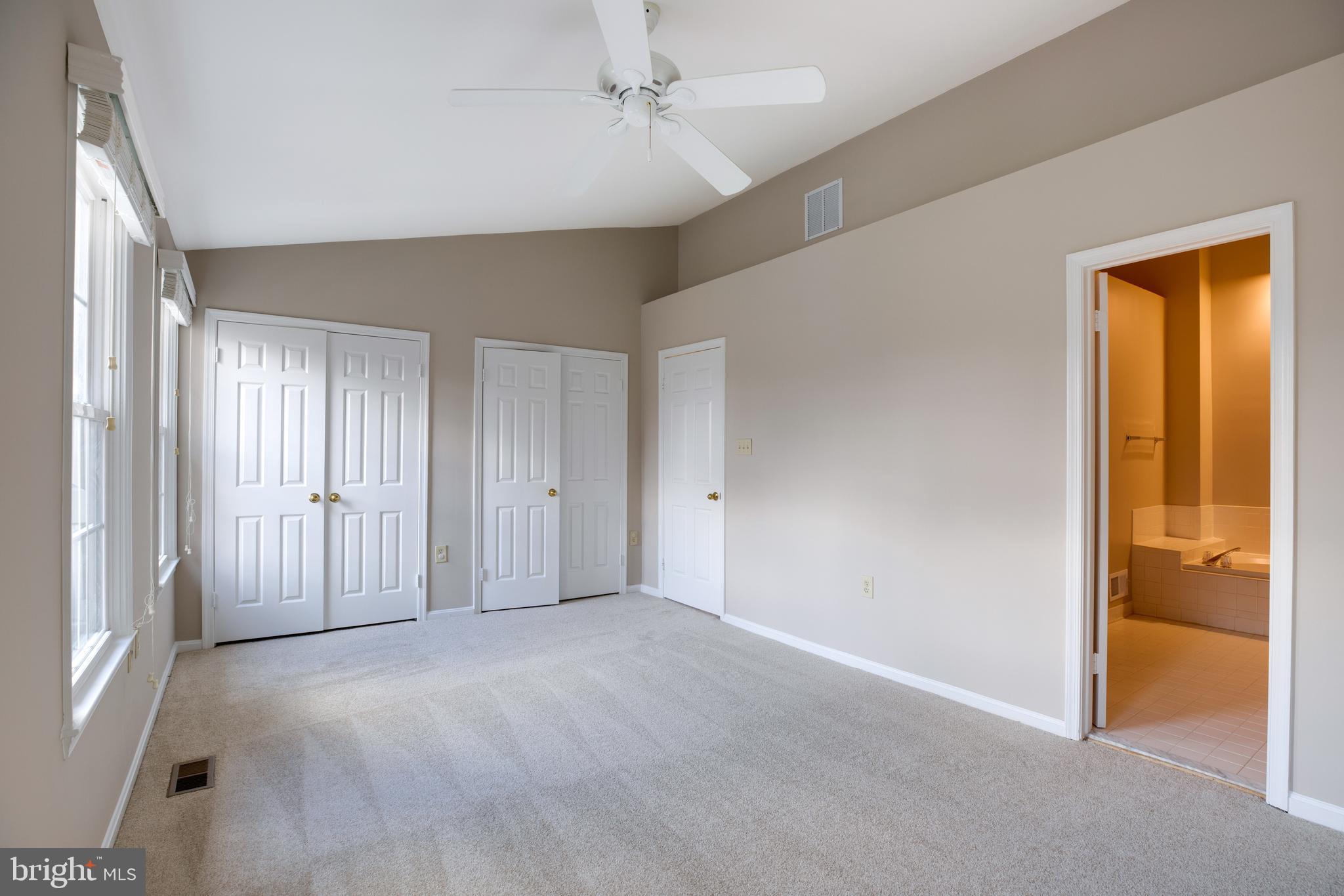 6502 Westhaven Lane Springfield, VA 22150 - Photo 20 of 31 an empty room with windows and closet
