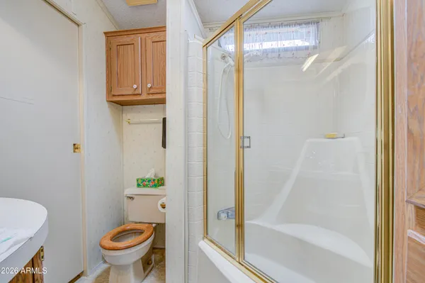 a bathroom with a sink and toilet