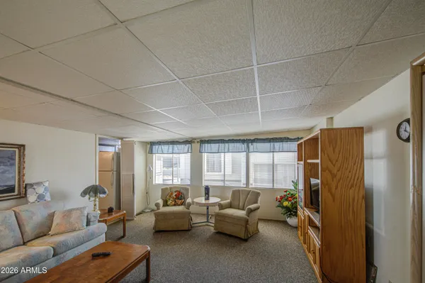 a living room with furniture and a window