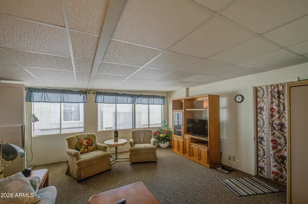 a living room with furniture and a window