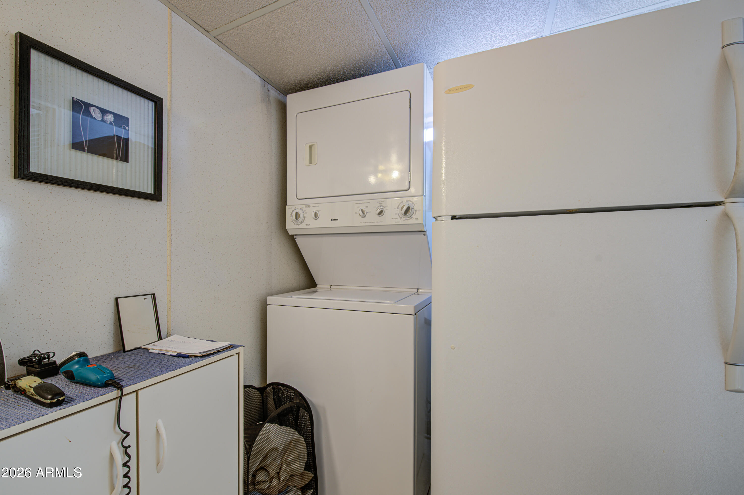 111 South Greenfield Road, Unit 747 Mesa, AZ 85206 - Photo 21 of 23 a utility room with dryer and washer