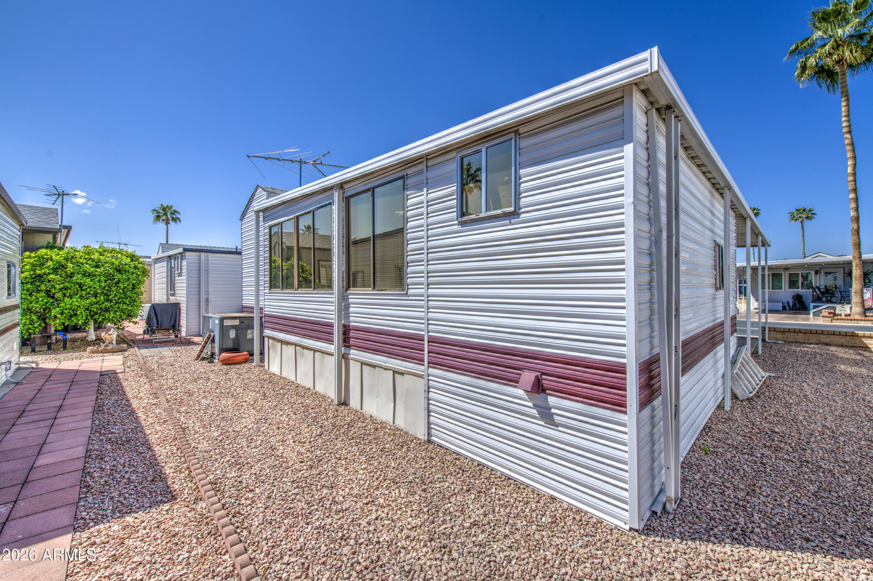 111 South Greenfield Road, Unit 747 Mesa, AZ 85206 - Photo 23 of 23 a view of a house with a patio