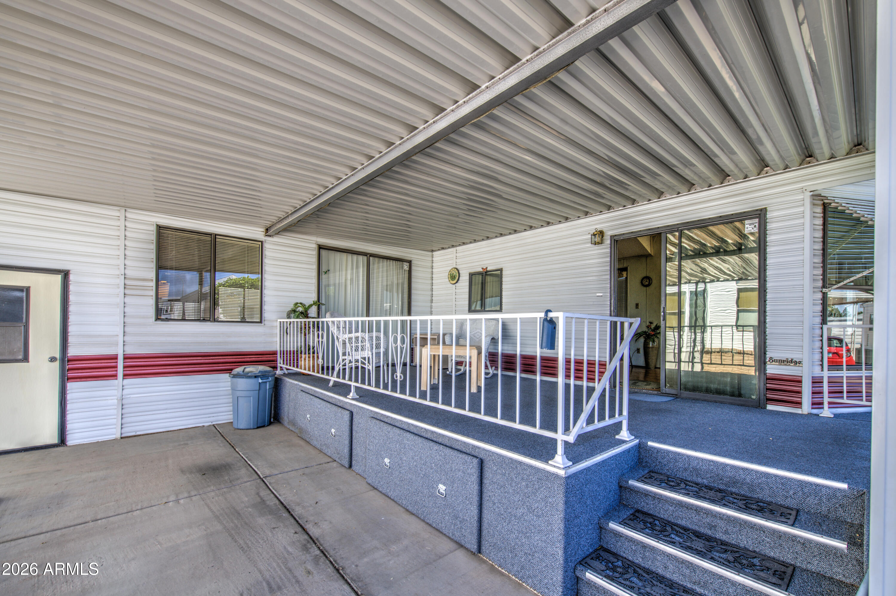 111 South Greenfield Road, Unit 747 Mesa, AZ 85206 - Photo 5 of 23 a view of an outdoor sitting area