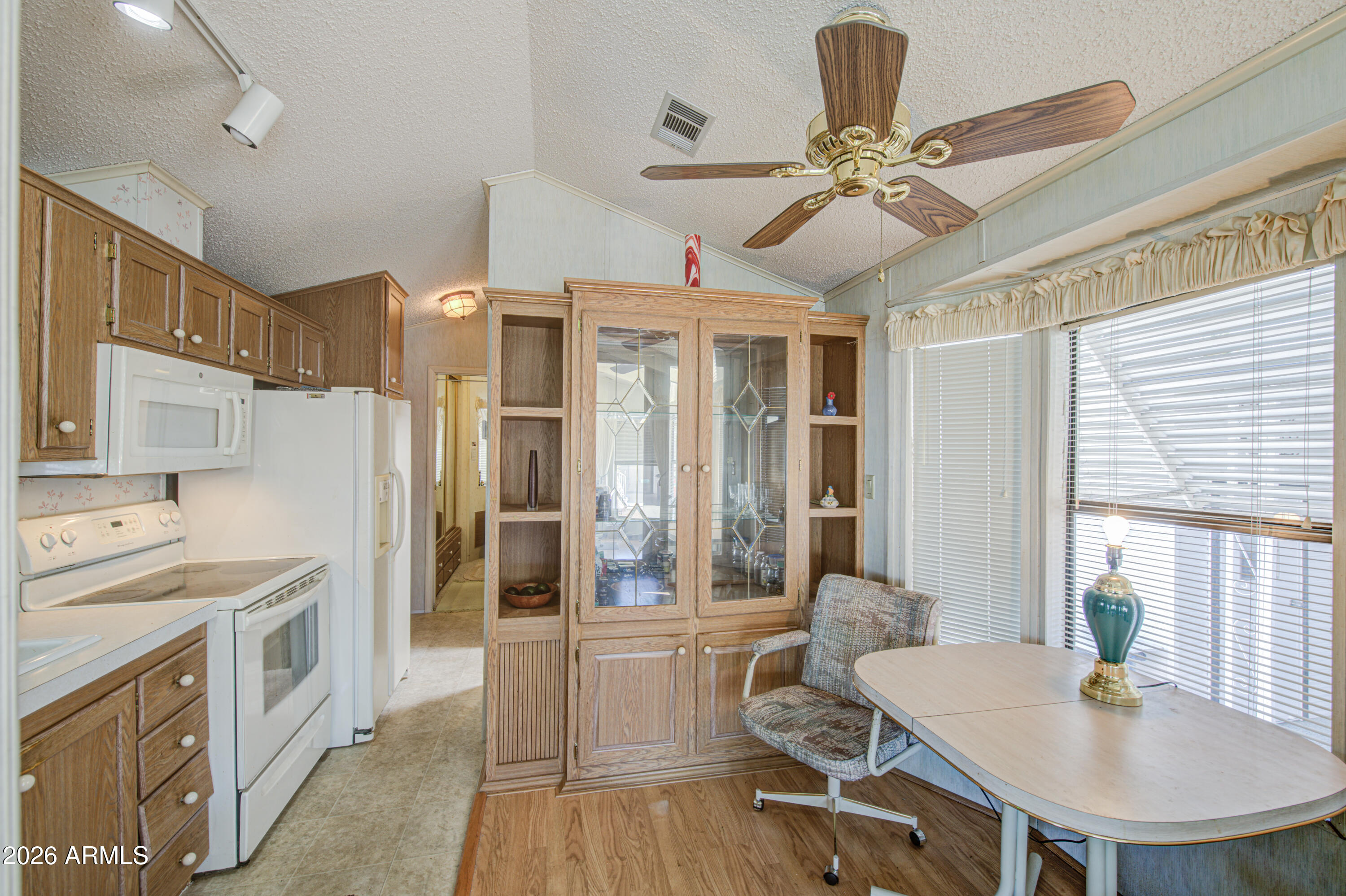111 South Greenfield Road, Unit 747 Mesa, AZ 85206 - Photo 10 of 23 a workspace with furniture and window